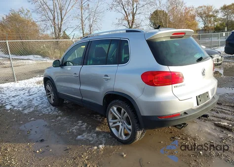 2013 Volkswagen Tiguan Sel z USA, uszkodzony, nr VIN WVGBV7AX9DW558362